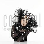 25-02-2004 Trudy Labij at studio in Amsterdam, on behalf of poster -La Bij, Ik voel mij goed-, by order of impresariaat Jacques Senf, February 25, 2004 

[keywords]Posed, Black & White, Dots[/keywords]